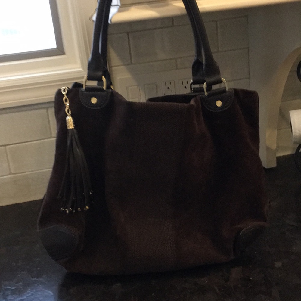 Rich suede with leather and gold details